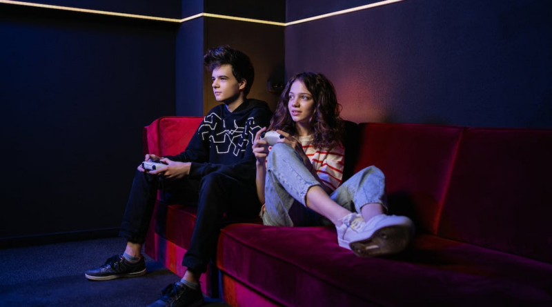A Man and Woman Playing Video Games